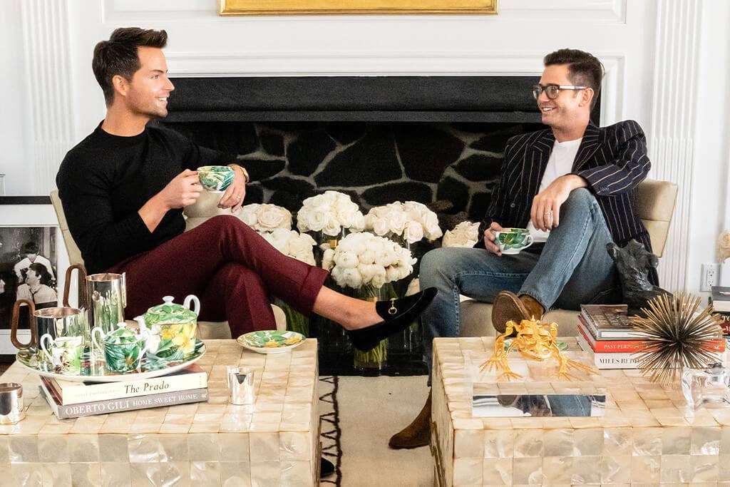 Josh and Bobby sip tea in the Architectural Digest worthy home Josh Flagg and Bobby Boyd in their living room