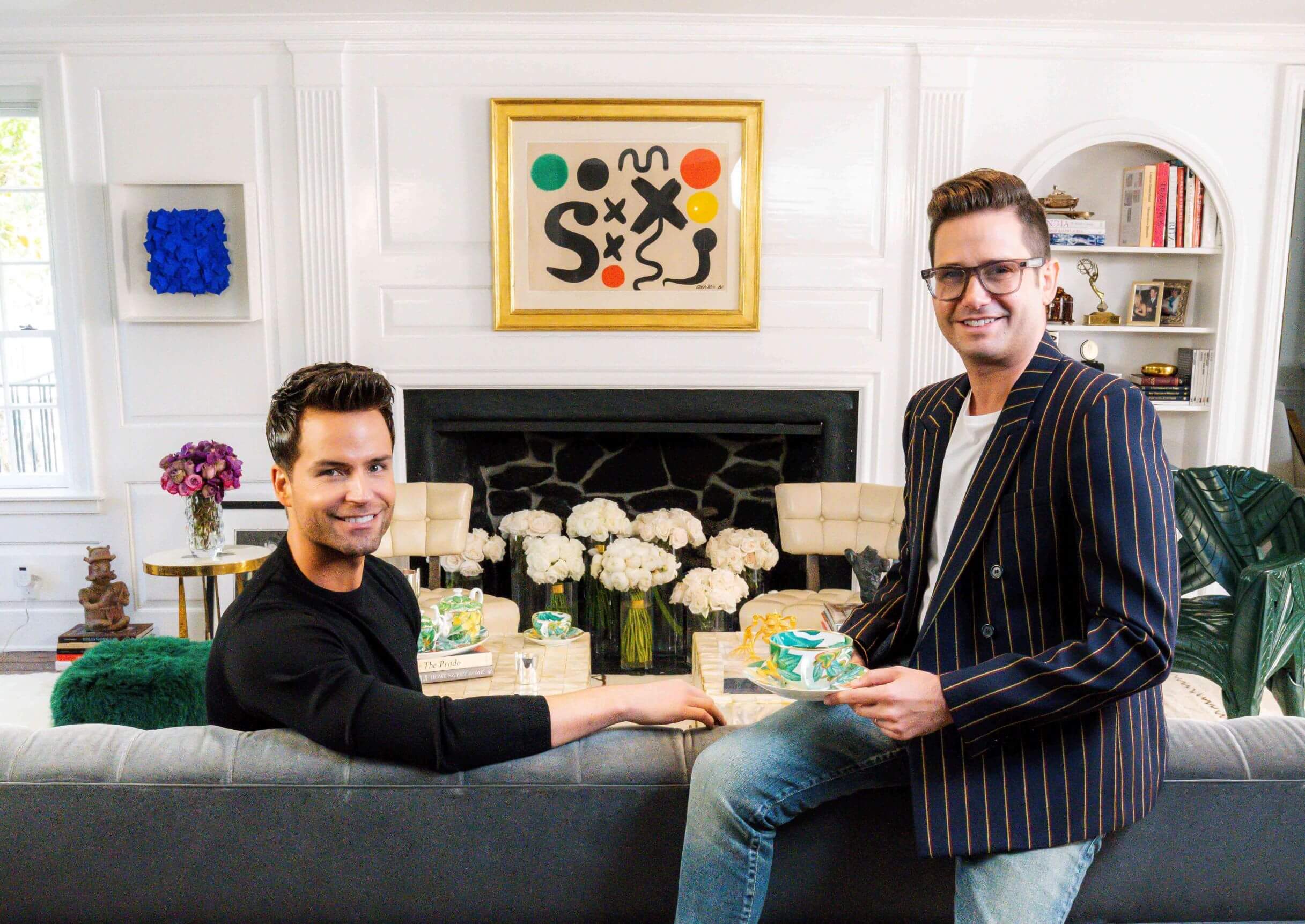 Josh and Bobby smile into camera Josh Flagg and Bobby Boyd at home