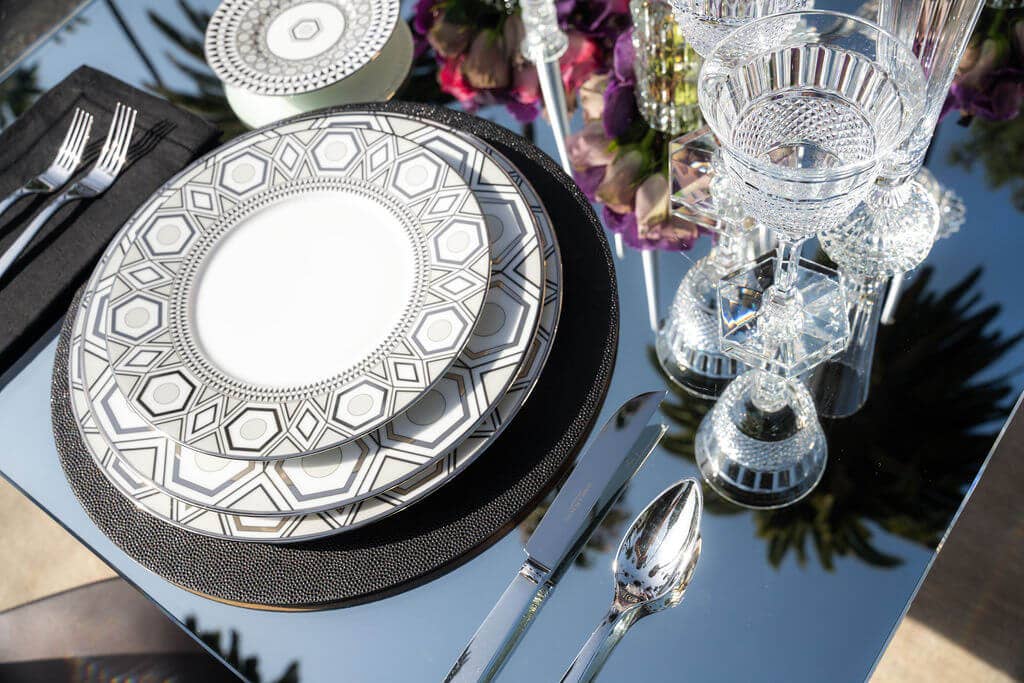 Hollywood Haviland dinnerware set on Baccarat table with palm tree reflection Hollywood Haviland tablescape on Bedford drive