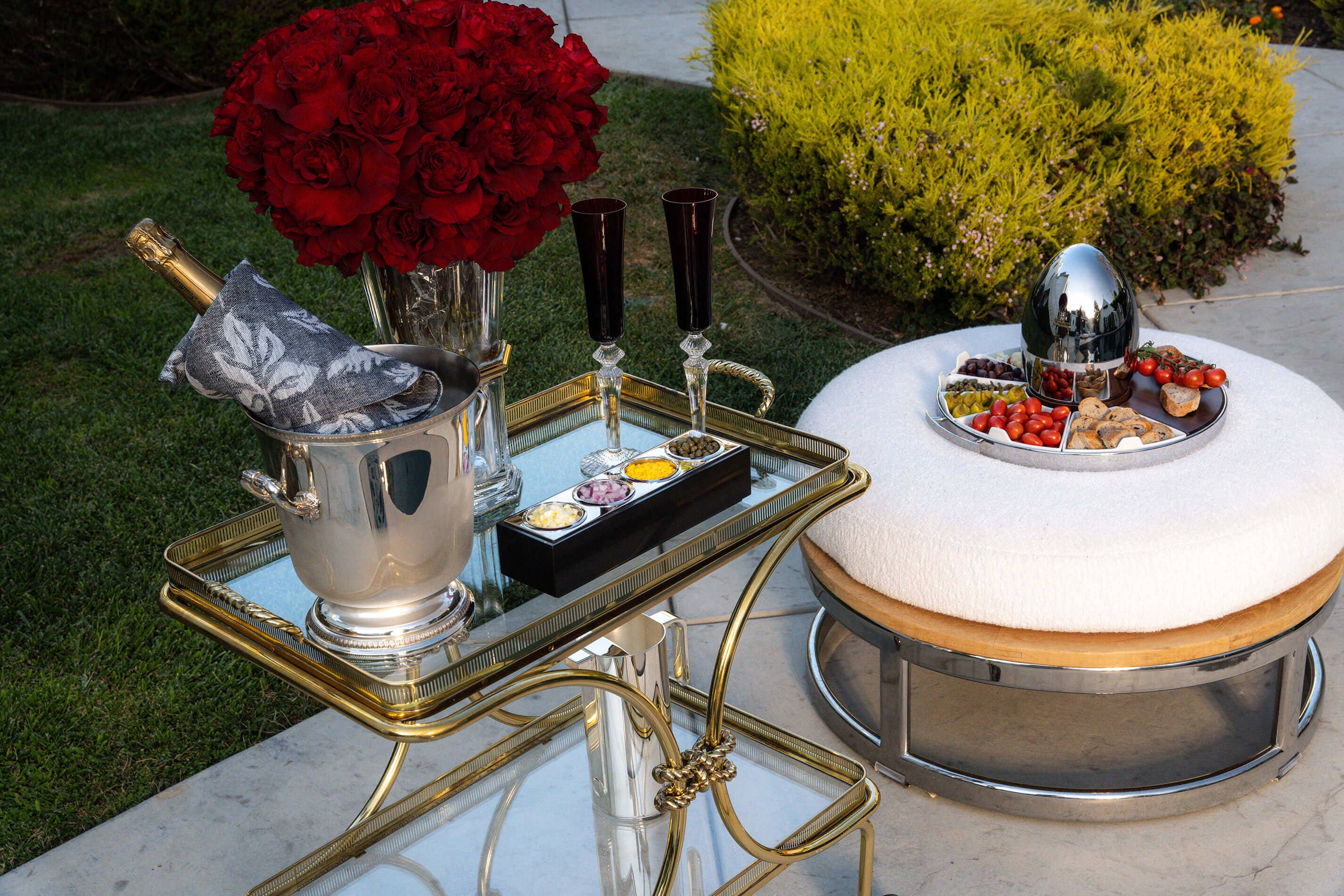 Christofle MOOD set and party tray with Baccarat flutes Caviar set up by the pool