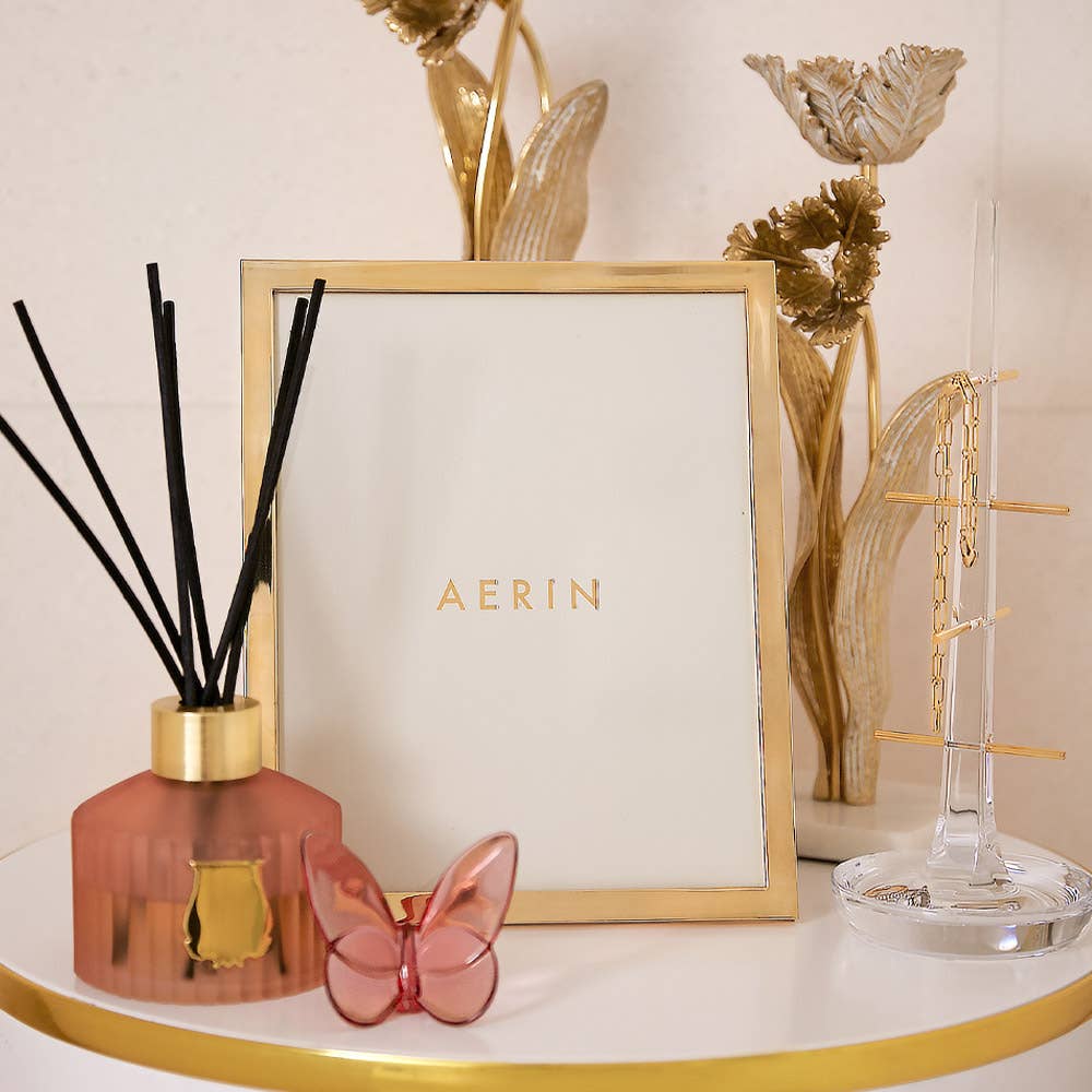 Shop our curated collection of Gifts for Her, including Michael Aram candleholders, Baccarat Lucky Butterfly, and more