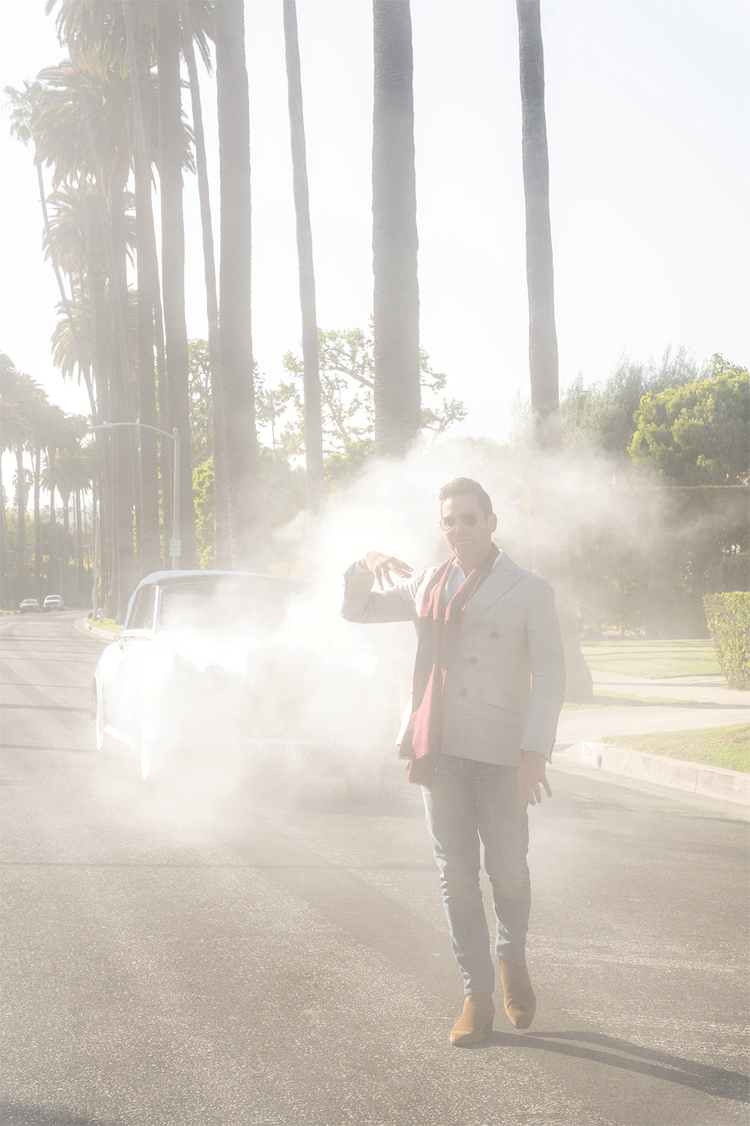 Josh Flagg makes the best of the situation by laughing into camera Josh Flagg on Bedford drive with the steaming vintage car